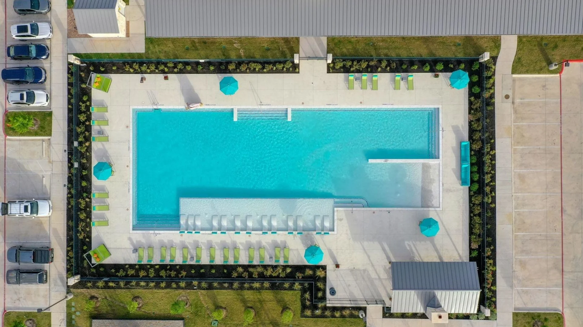 an aerial view of a pool and parking lot at The Biltmore at  Park