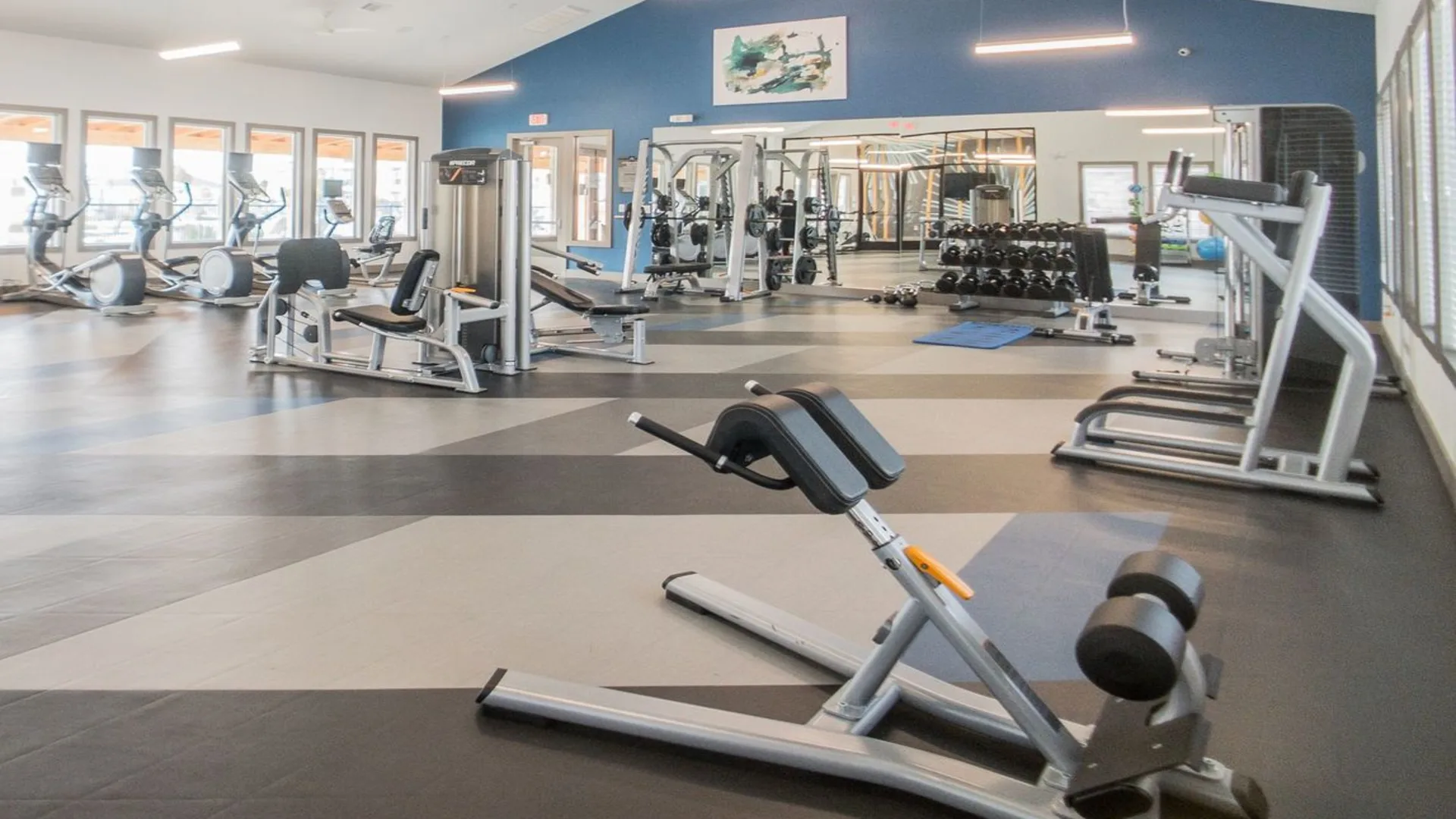 a gym with exercise equipment and treads at The Biltmore at  Park